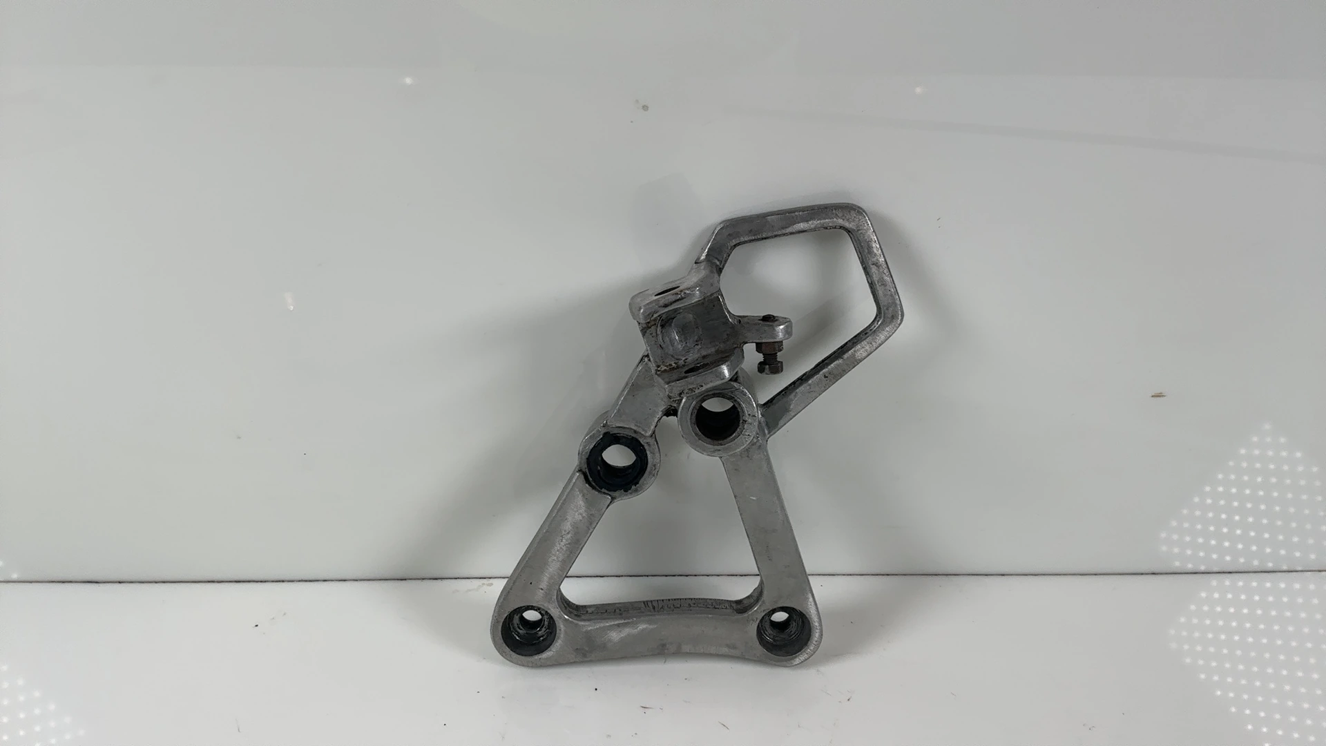 Honda CBR600F PC19 600 Front Right Foot Rest Hanger 1987-1990 OEM 50600-KT8-000 - Image 1