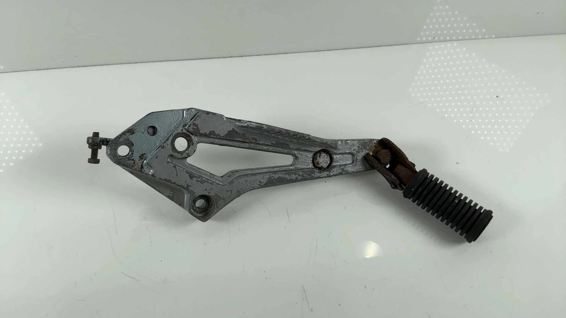 Yamaha RD125LC RD125 Right Rear Footrest Bracket Hanger 1985-87 OEM 10W-27443-01