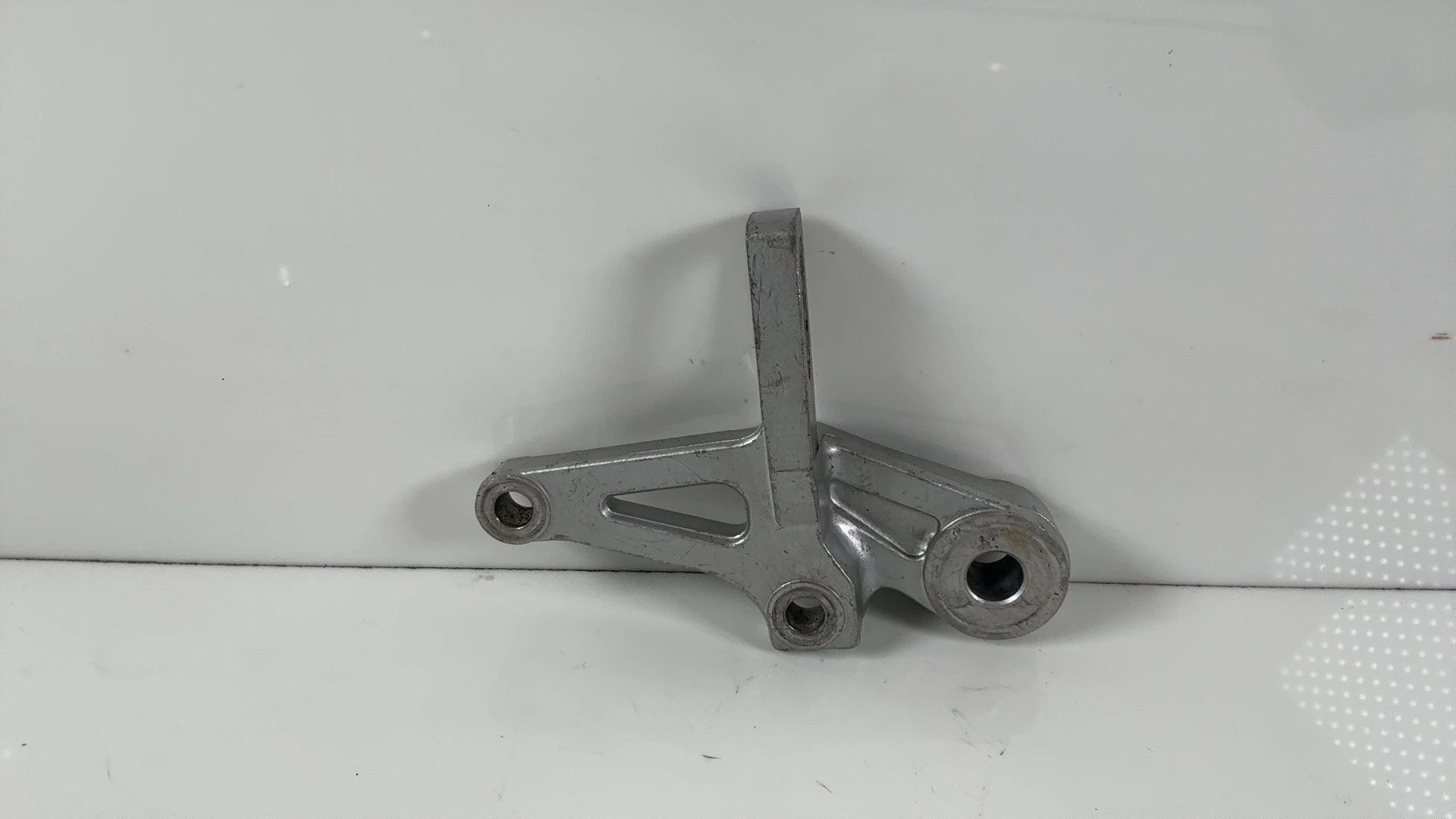 Yamaha TZR250 1KT 250cc Rear Caliper Bracket 1986-1989 OEM 1KT-25819-00 - Image 1