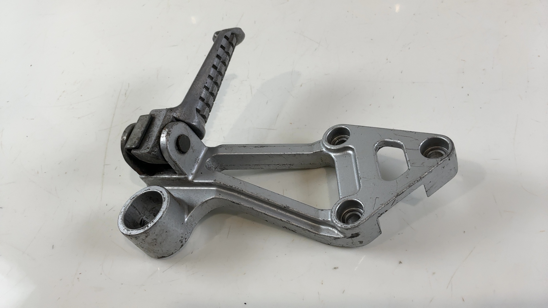 Kawasaki Ninja ZX1000 ZX10 Rear Right Footrest Bracket 1988-90 OEM 35011-1425-CE