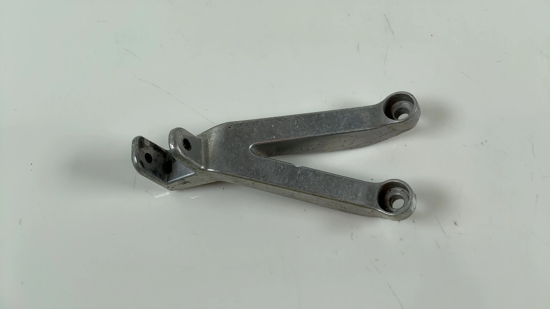 Honda CBR900RR SC50 954cc Rear Left Footrest Hanger 2002 2003 OEM 50760-MCJ-750