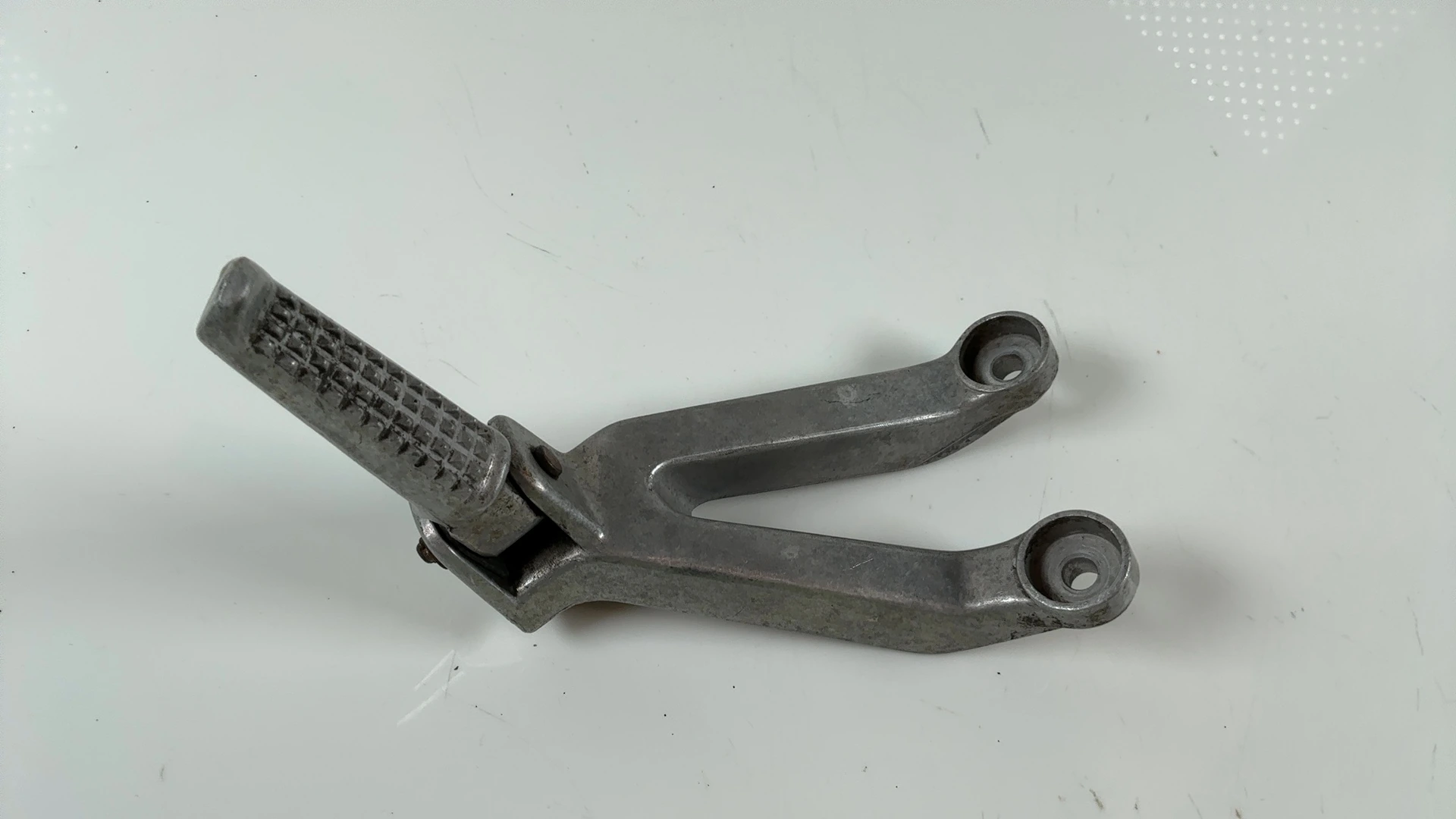 Honda CBR900RR SC33 900CC Left Rear Foot Peg Bracket 1998-99 OEM 50760-MW0-000