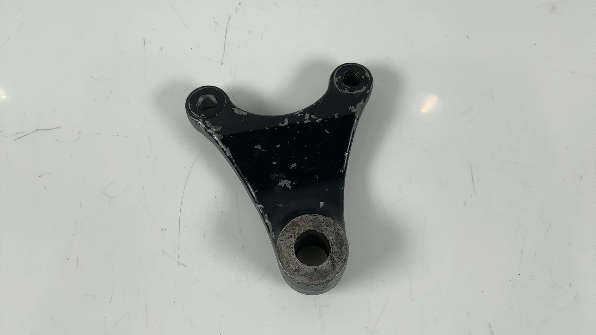 Suzuki GS750 GS750E 750 CC Rear Brake Caliper Bracket 1980-1981 OEM 69721-47011 - Image 1