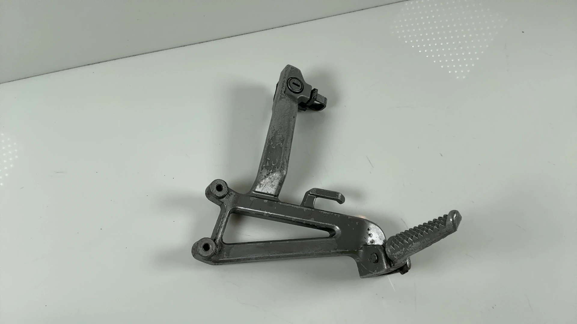 Honda CBR600F3 PC31 600cc Left Passenger Footrest Bracket 1995-98 50760-MV9-930