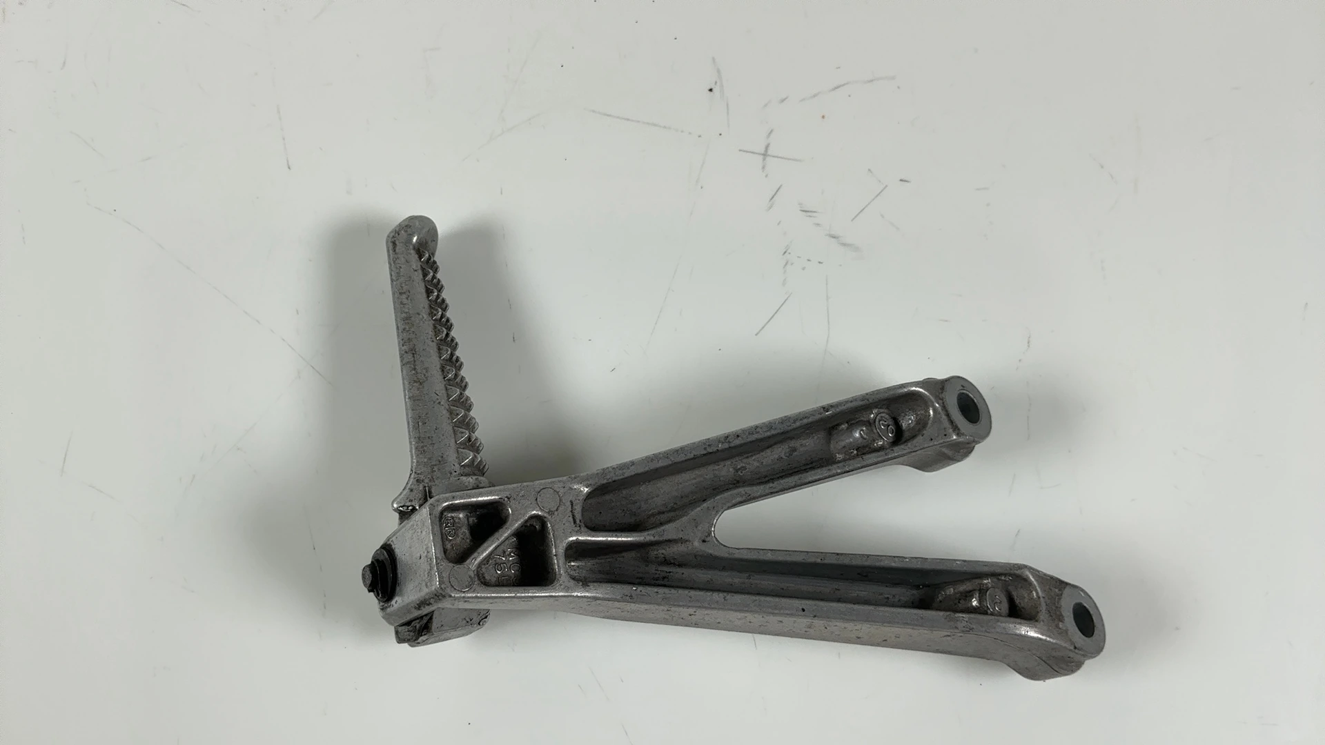 Honda CBR954RR SC50 954cc Left Rear Footrest Bracket 2002-2003 OEM 50750-MCJ-75L - Image 4