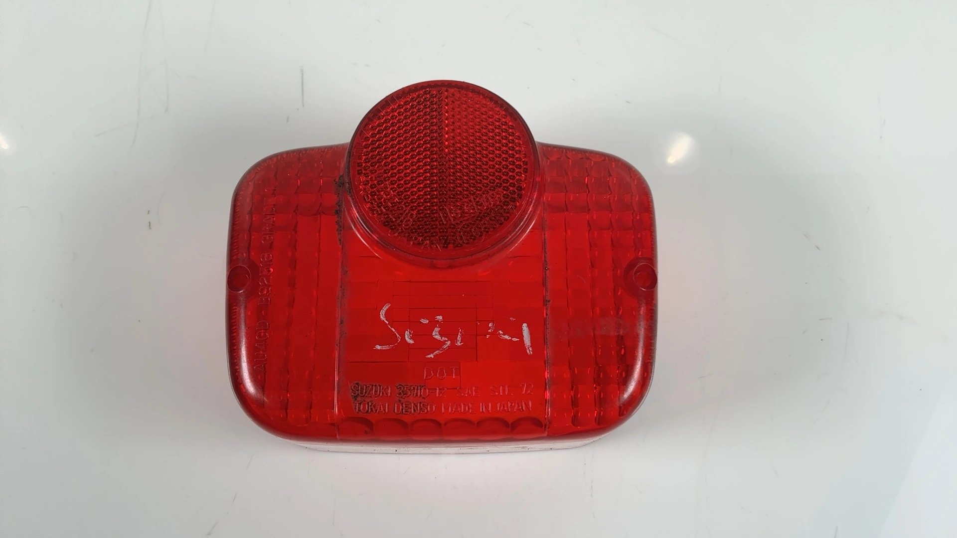 Suzuki RV125 Tracker 125CC Tail Light Lens 1972-1982 OEM 35712-27630 - Image 1