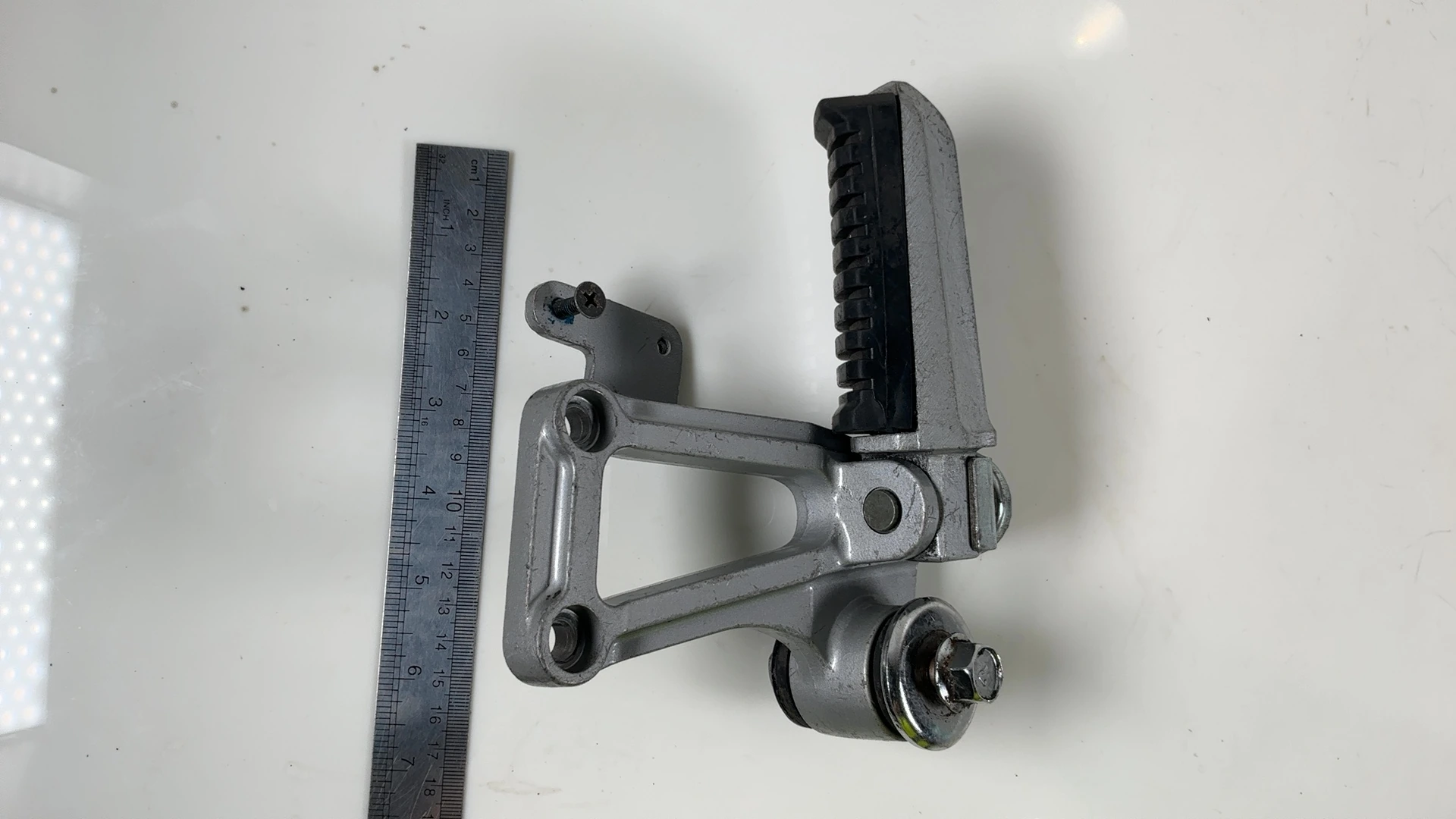 Kawasaki Ninja GPZ600R ZX600A Left Rear Foot Rest Bracket 1985-87 OEM 35011-1242 - Image 4