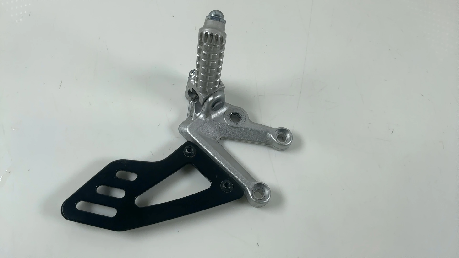 Aprilia Tuono V4 Factory 1100 Left Front Foot Rest Hanger 2017-2026 OEM 2B012339