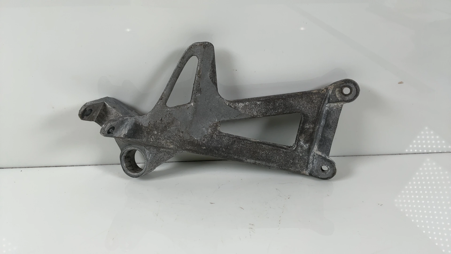 Triumph Sprint ST 955i 955cc Right Rear Footrest Bracket 1999-2004 OEM T2080587 - Image 1
