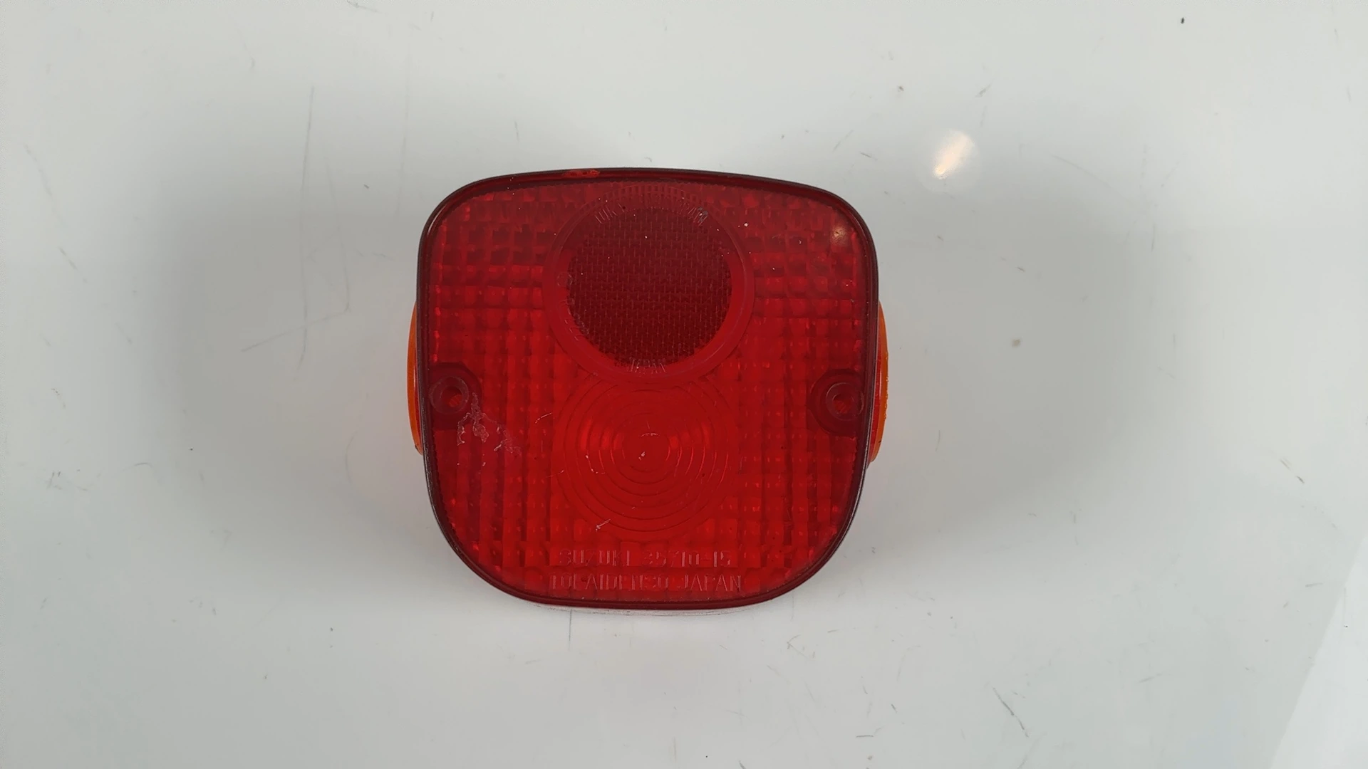 Suzuki TS125 125 Tail Light Lens 1970-1980 OEM 35712-35012 - Image 1