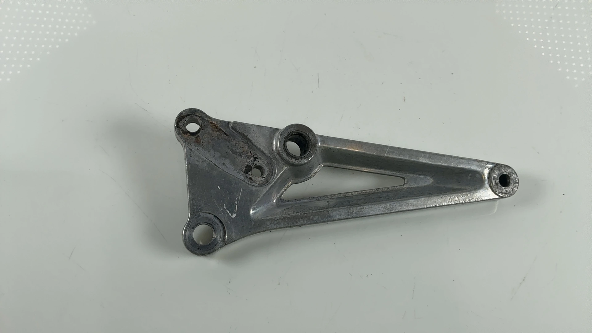 Honda Nighthawk CB250 250cc Front Right Footrest Bracket 1991-08 50600-KC1-000 - Image 1