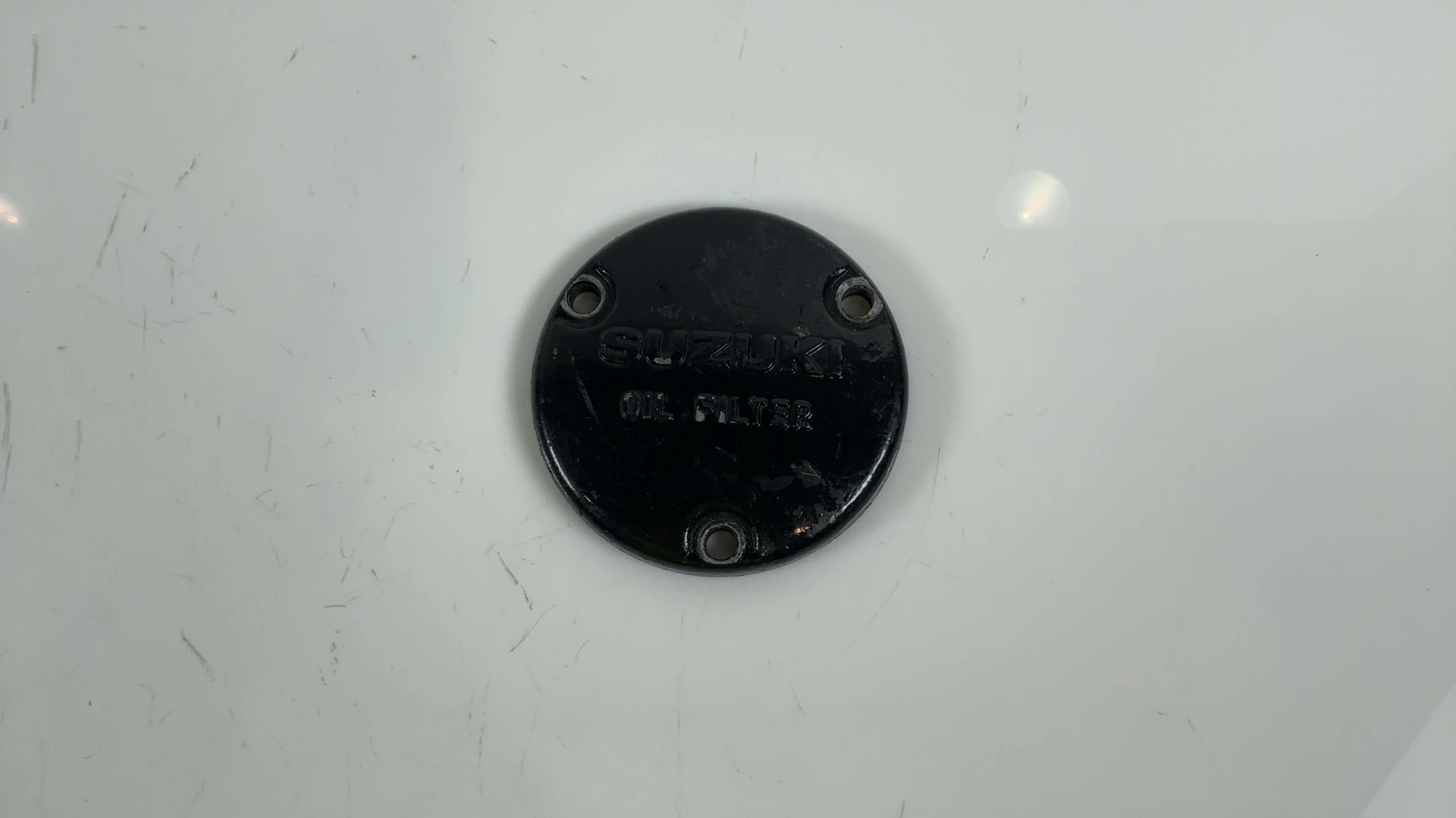 Suzuki SP125 SP100 125cc Oil Filter Cover Cap 1982-1997 OEM 16512-05210 - Image 1