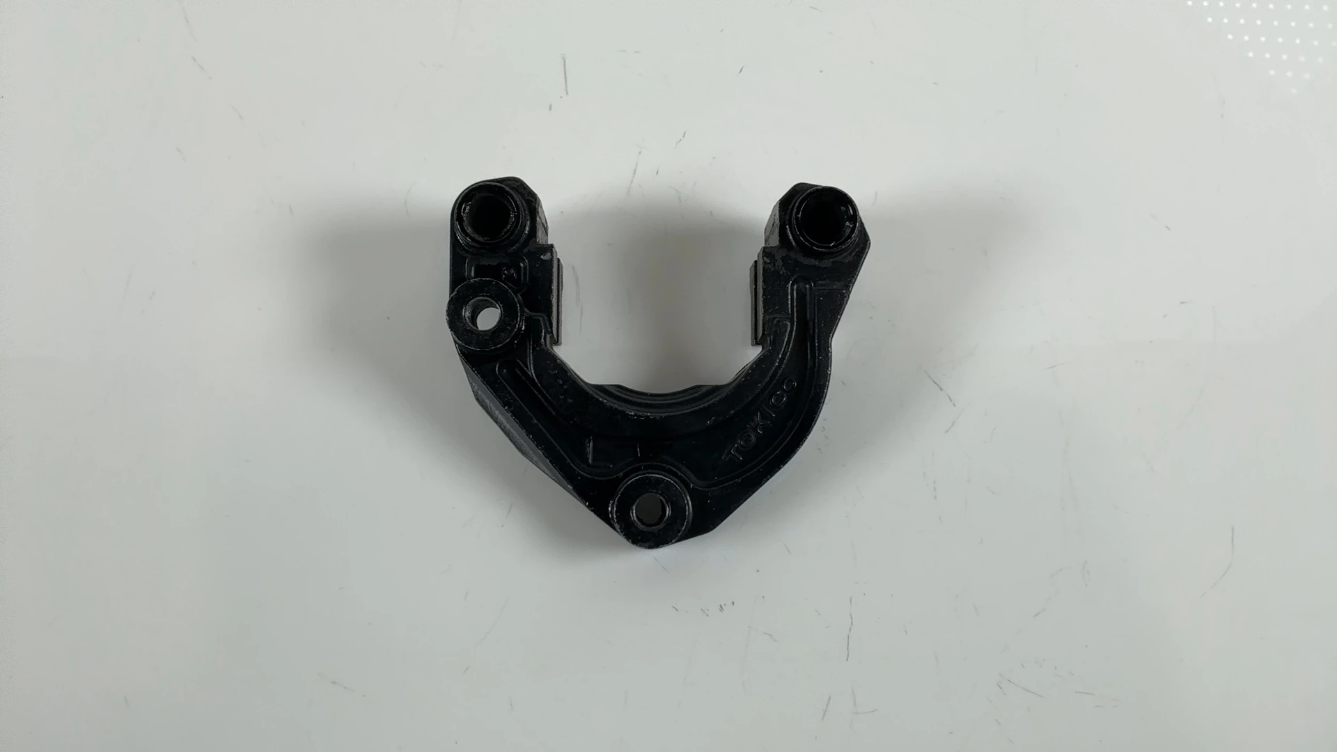 Kawasaki KZ1000P Front Left Brake Caliper Bracket 1982-2005 OEM  43044-1064 - Image 1