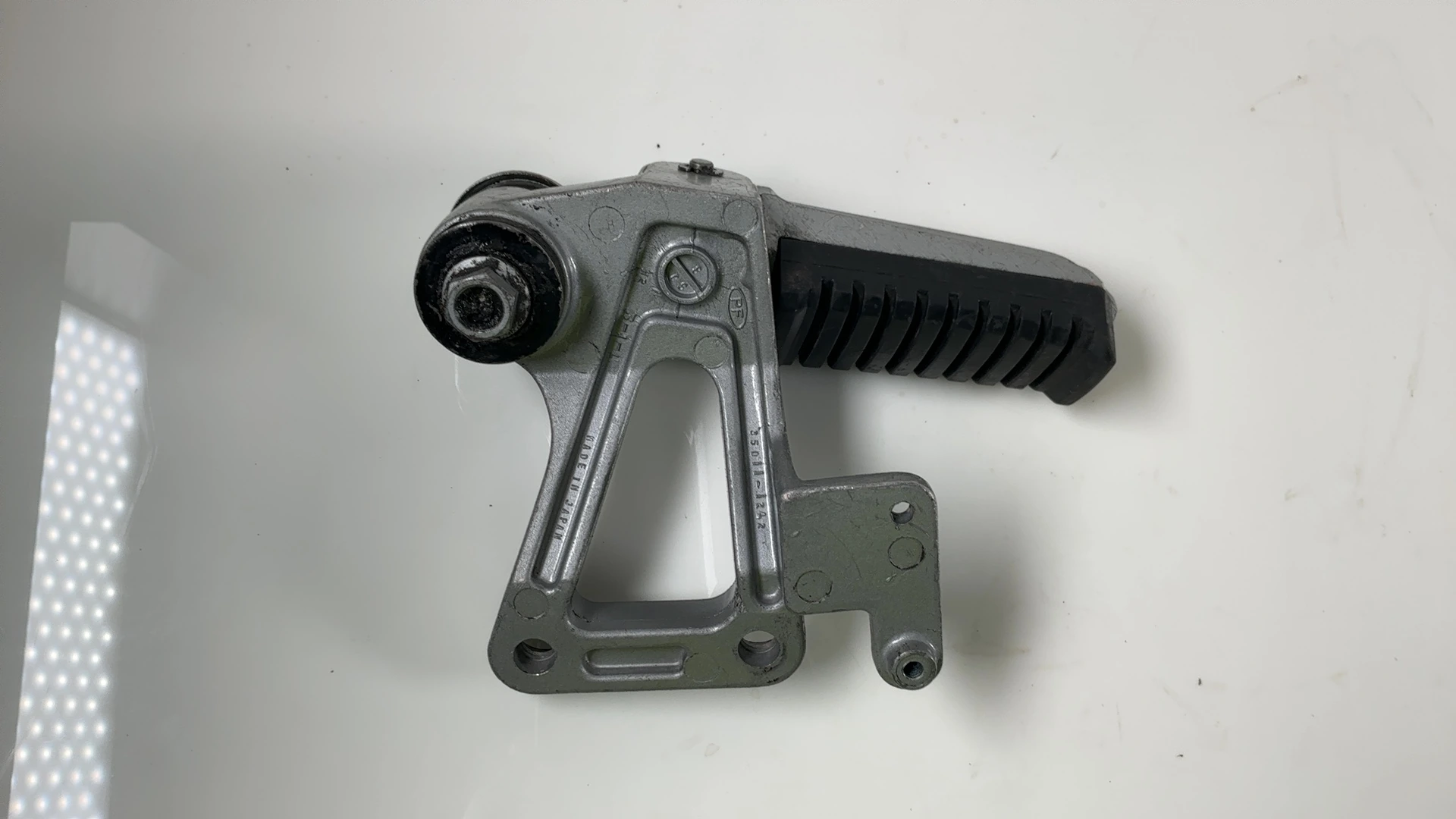 Kawasaki Ninja GPZ600R ZX600A Left Rear Foot Rest Bracket 1985-87 OEM 35011-1242 - Image 2