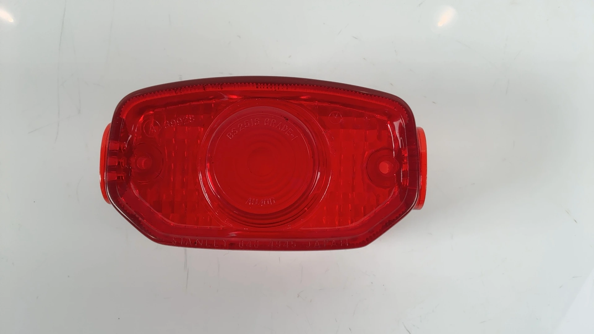 Yamaha FS1E 1M1-84521-60 50cc Tail Light Lens 1977-1978 OEM 1M1-84521-60 - Image 1