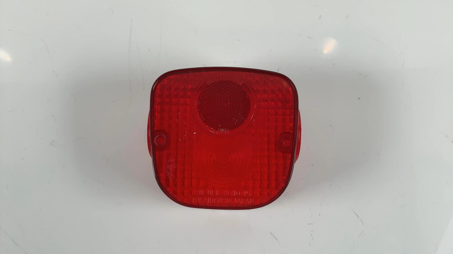 Suzuki TS125 125 Tail Light Lens 1970-1980 OEM 35712-35012 - Image 1