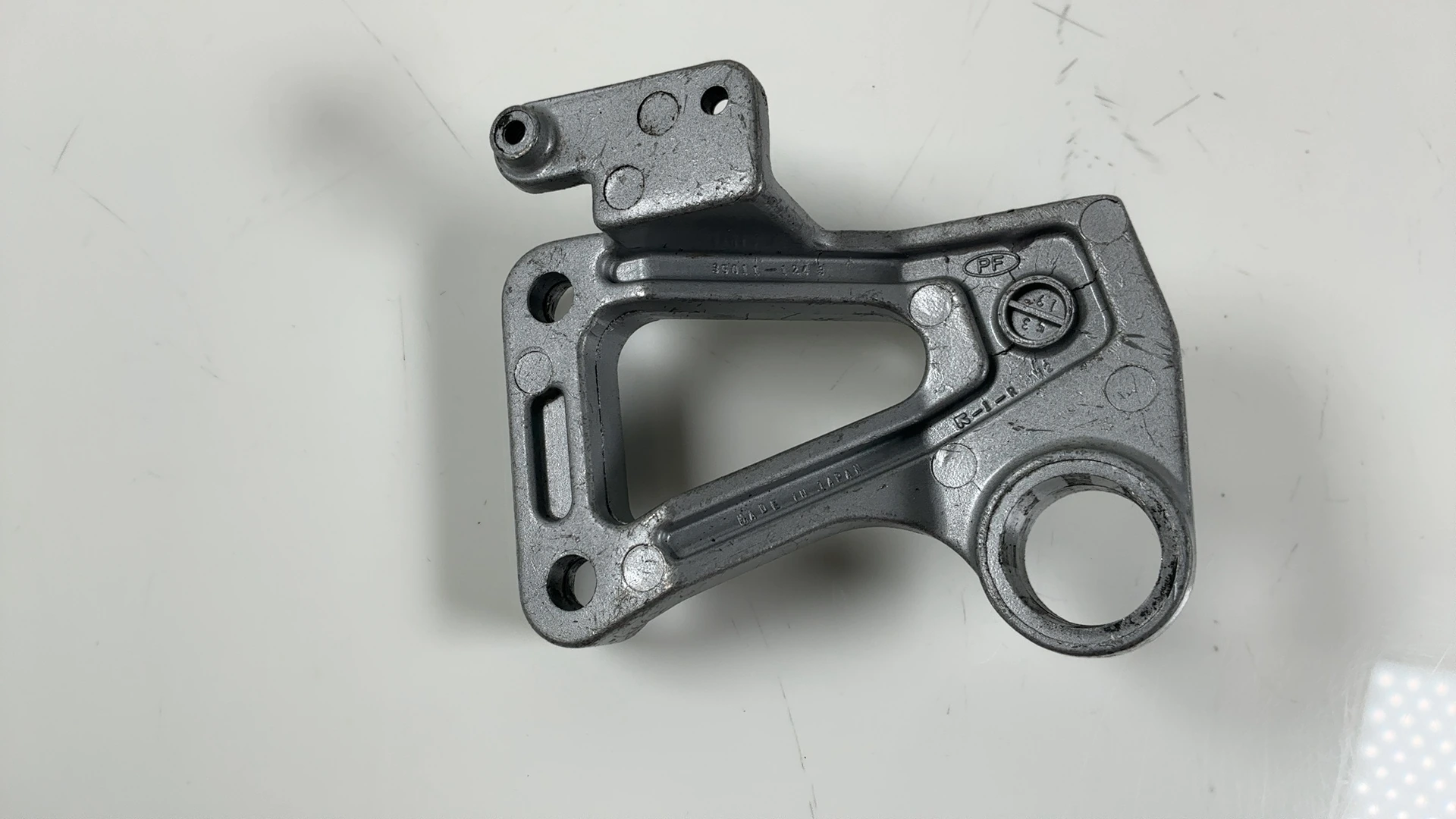 Kawasaki Ninja ZX600A 600cc Rear Right Footpeg Bracket 1985-1987 OEM 35011-1243
