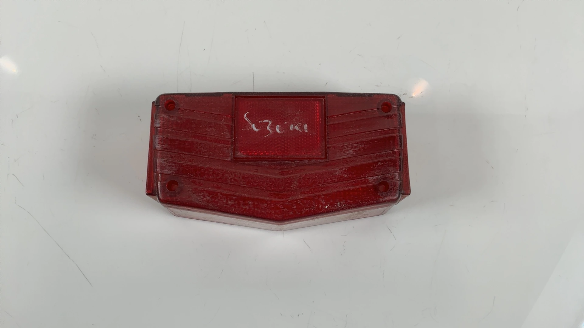 Suzuki GS450 CC Tail Light Lens 1980-1988 OEM 35712-44130 - Image 1