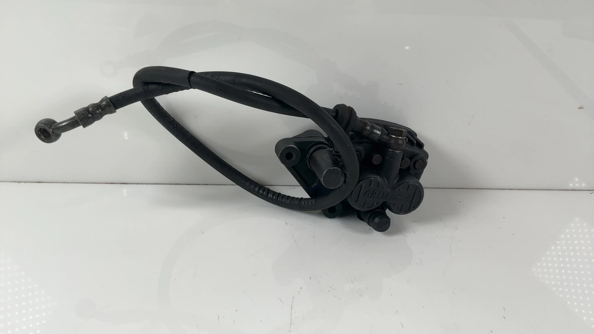 Honda NS125R NSR125 TC01 125cc Front Brake Caliper 1985-1987 OEM 45100-KB9-960 - Image 1