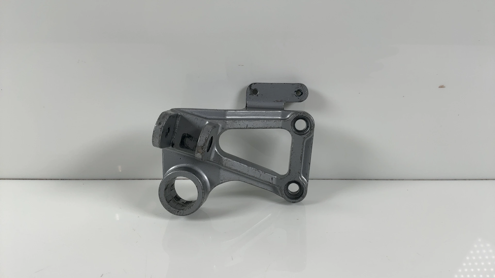 Kawasaki Ninja ZX600A 600cc Rear Right Footpeg Bracket 1985-1987 OEM 35011-1243 - Image 1
