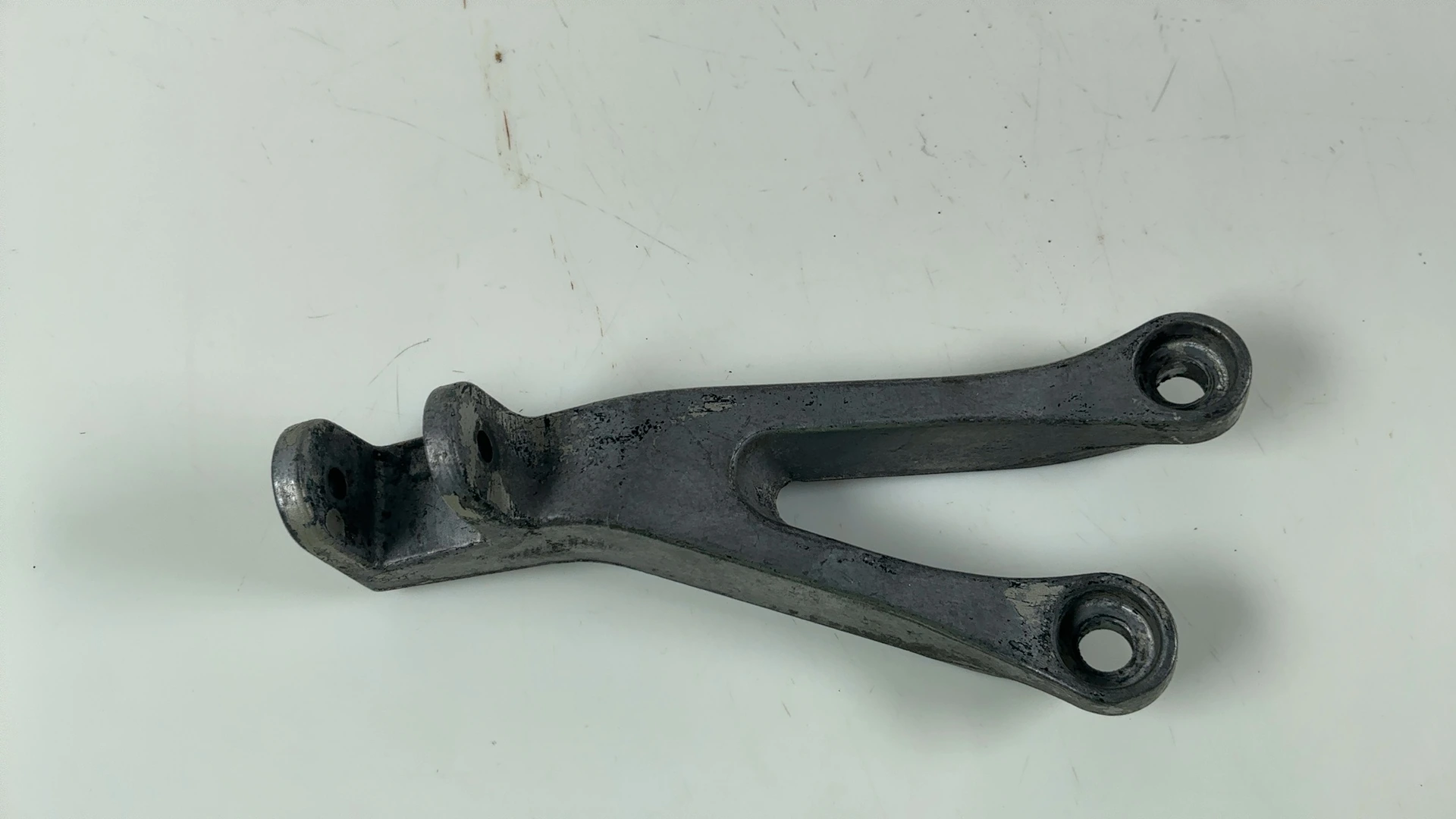 Kawasaki Ninja ZX-6R ZX600J Left Rear Footrest Bracket 2000-01 OEM 35011-1878-TX