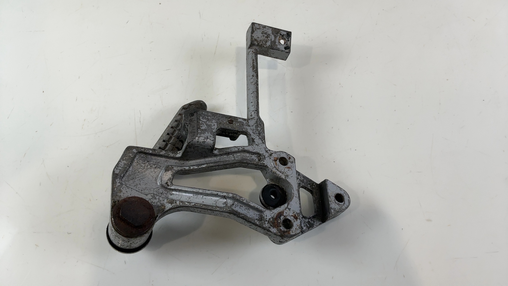 Kawasaki Ninja ZX750F 750cc Rear Left Footrest Bracket 1987-1990 OEM 35011-1312 - Image 1