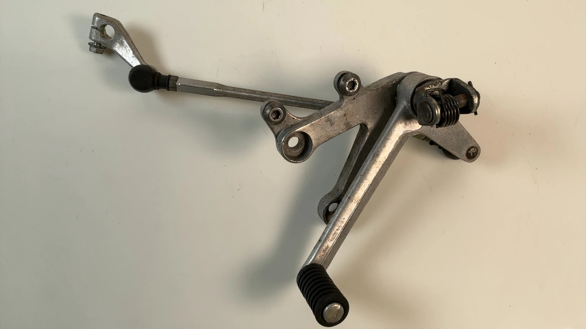 Honda CBR929RR 929cc Left Footrest Shifter Bracket 2000 2001 OEM 50700-MCJ-000