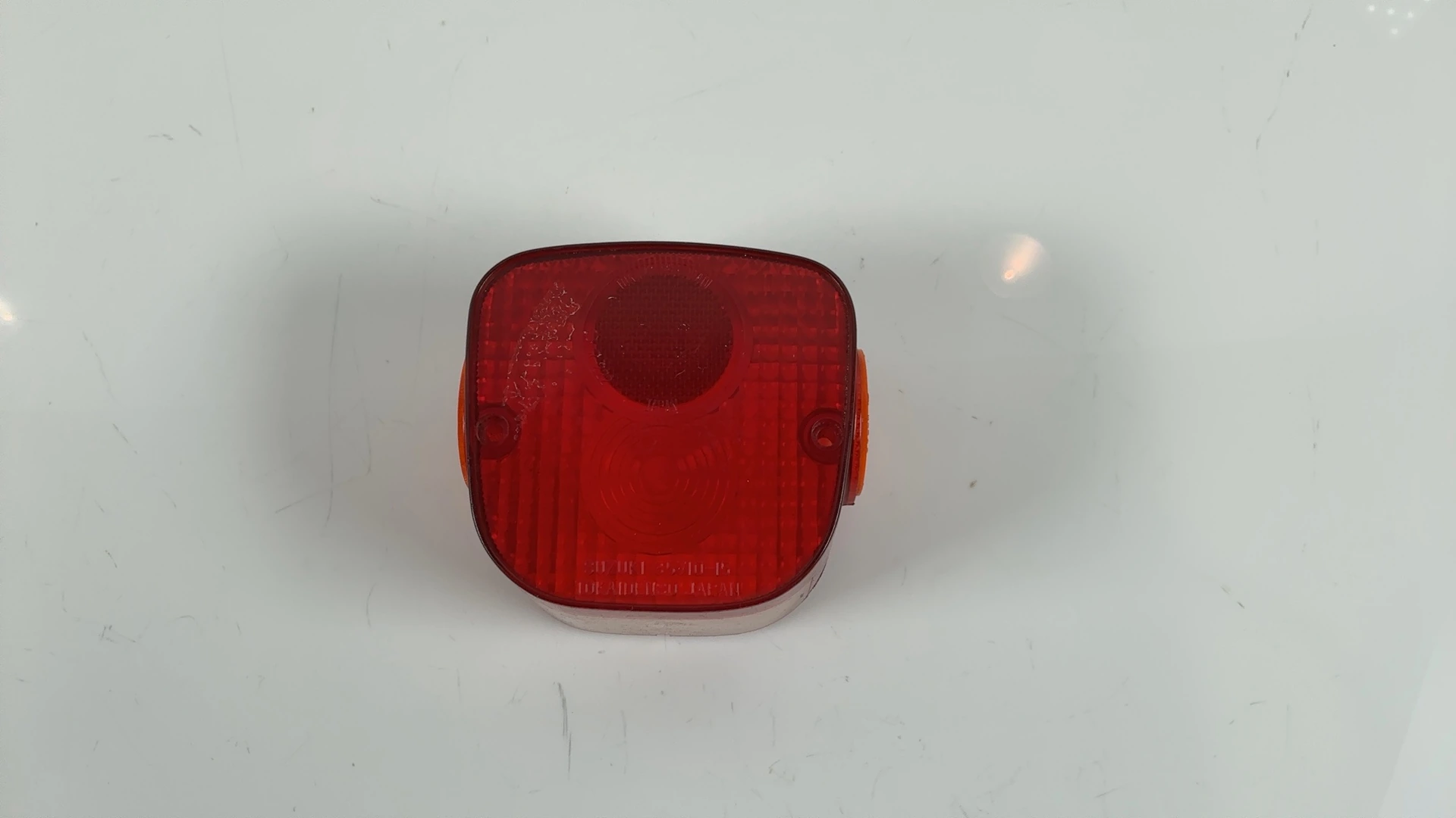 Suzuki TS125 125 Tail Light Lens 1970-1980 OEM 35712-35012 - Image 1