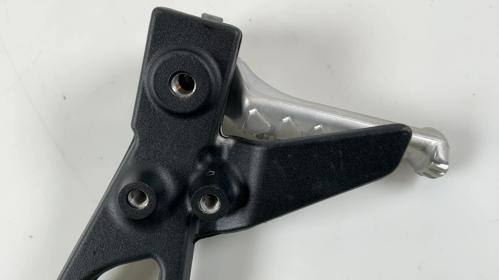 Aprilia RS660 Tuono 660 Rear Left Passenger Footrest Bracket 2021-2025 2B010850 - Image 5