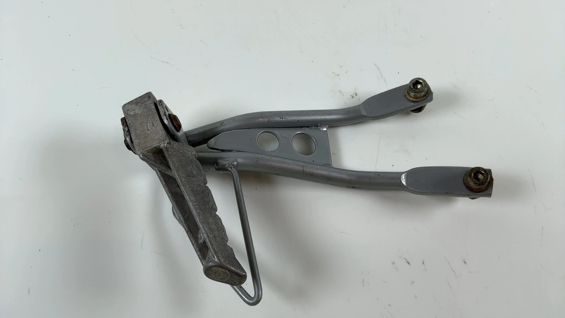 Peugeot XR6 50cc Left Passenger Footrest Peg Bracket 2003 2007 OEM 756475 - Image 1