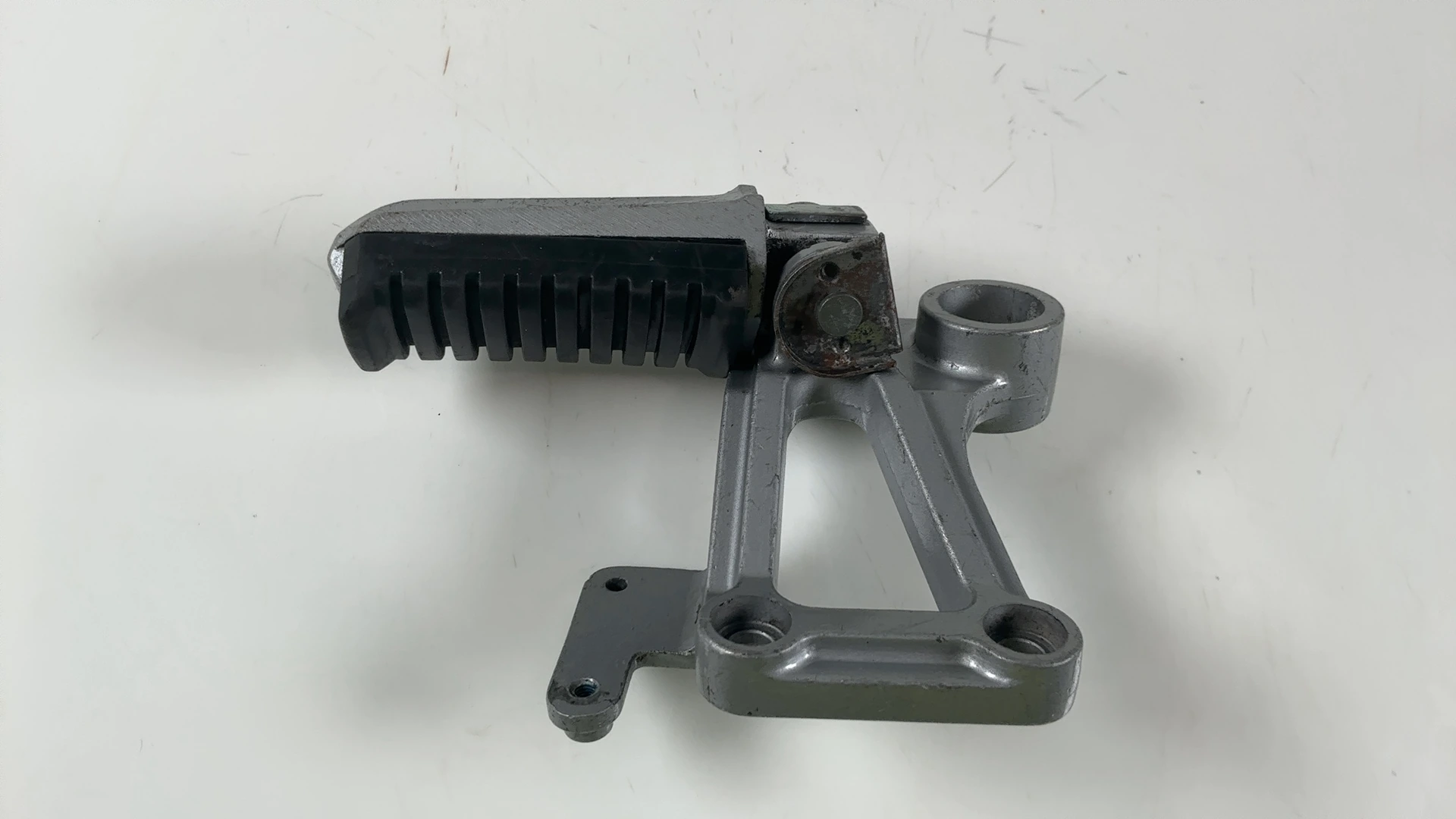 Kawasaki Ninja ZX600A 600cc Rear Left Foot Peg Bracket 1985-1987 OEM 35011-1242